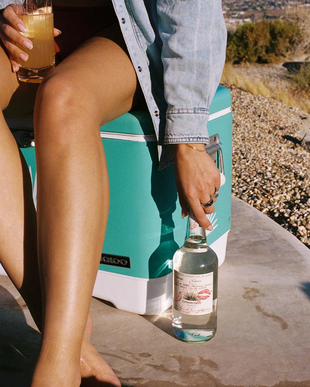 Casamigos bottle in sand