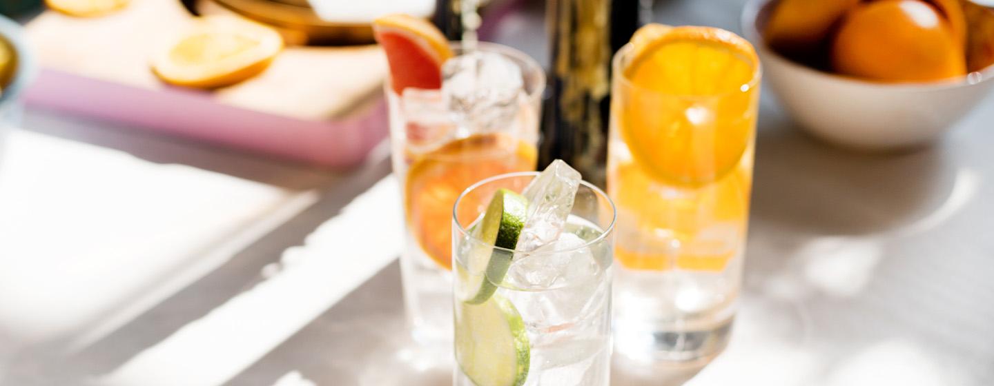 three cocktails on a table