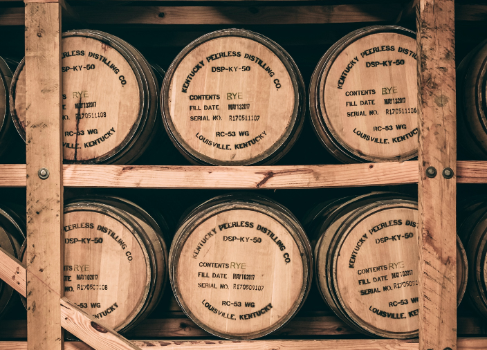 Whisky barrels on shelves 