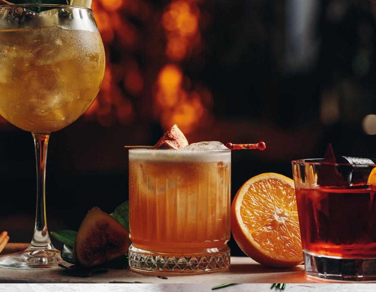 Selection of cocktails with garnish.