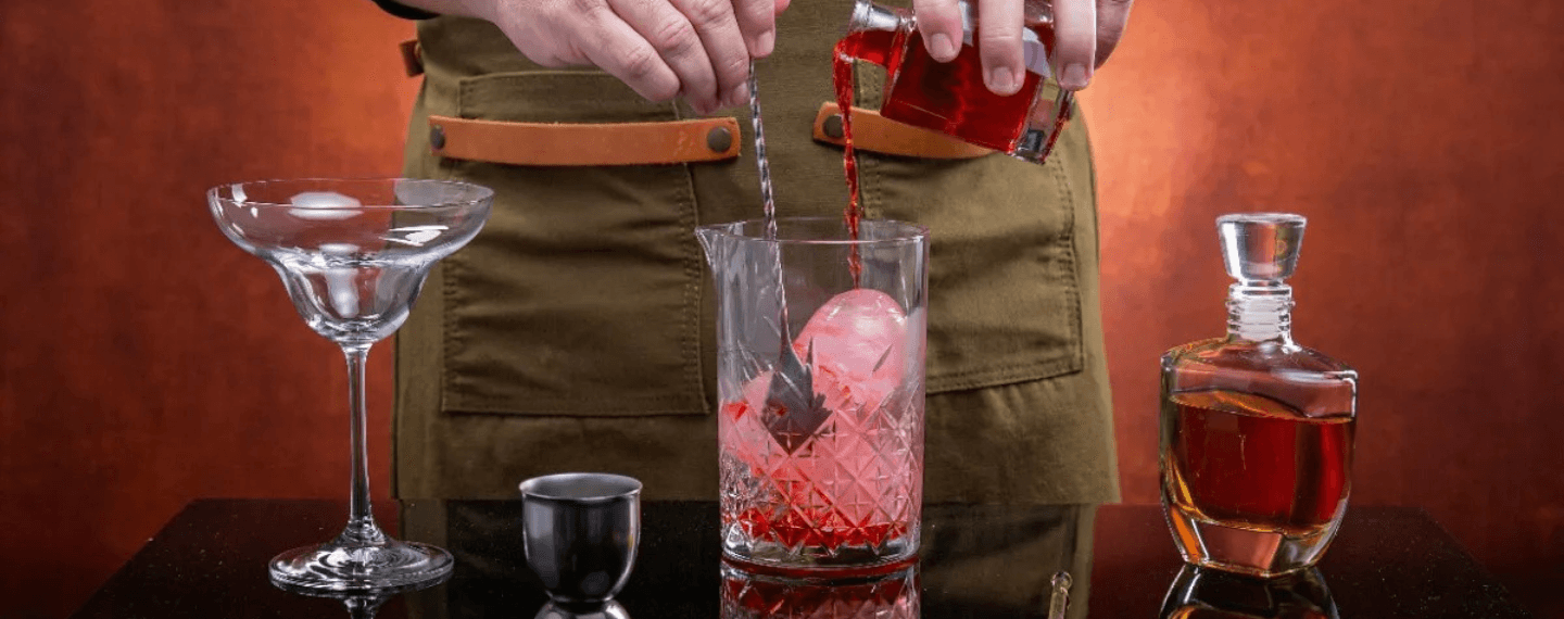 bartender with three cocktails