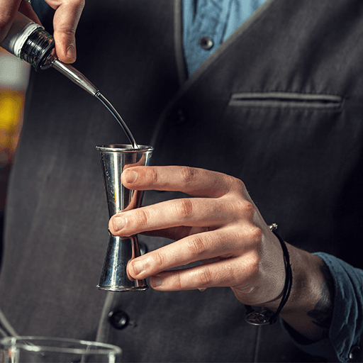 bartendering pouring into a glass
