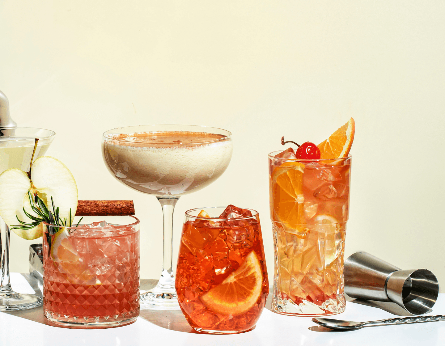 Whisky cocktails with a measure and stirrer,
