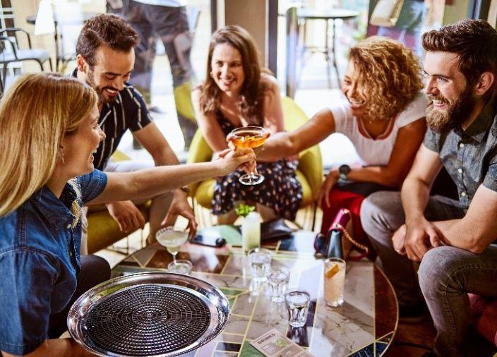 People enjoying drinks together