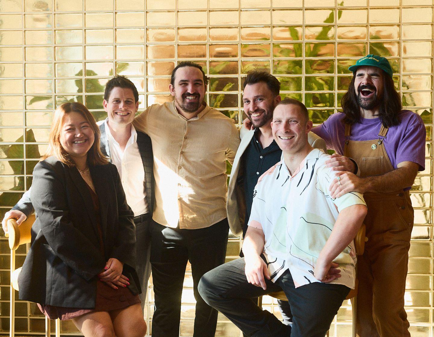 The finalists celebrating after completing the first two challenges.