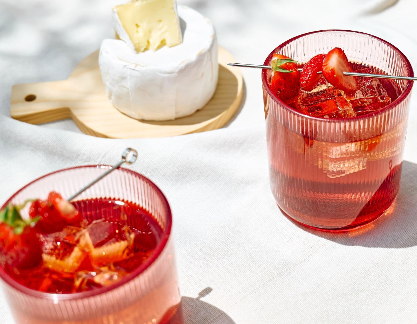 Cocktails and side plate of food 