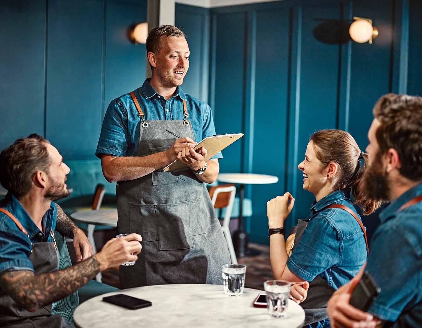 Bar manager answering questions 