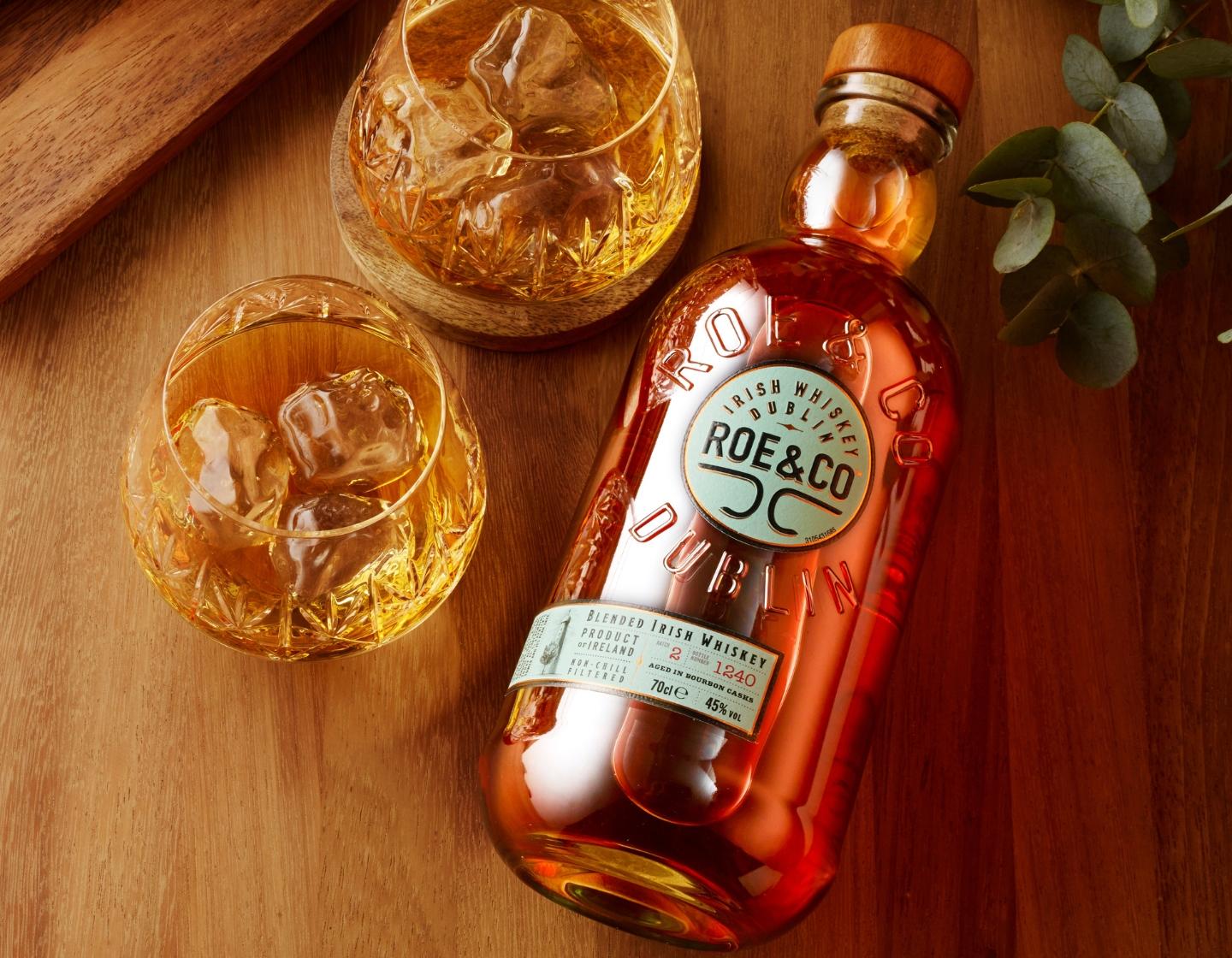 Roe & Co bottle with two neat serves.