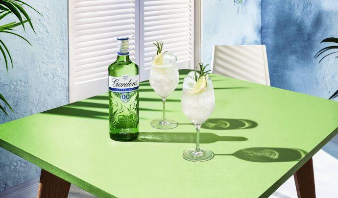 Gordon's bottle accompanied by two garnished non alcoholic cocktails.
