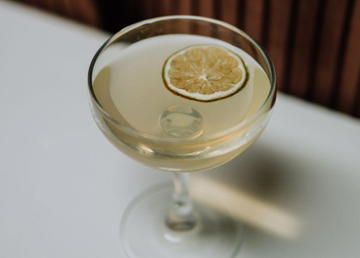 Acca Daccari cocktail with lime slice.