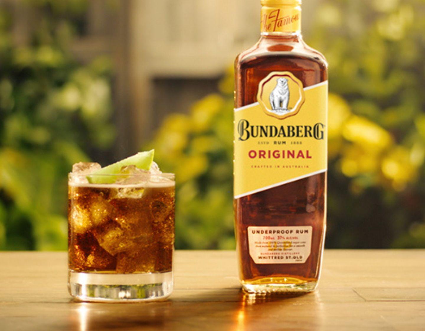 Rum bottle with a rum cocktail.