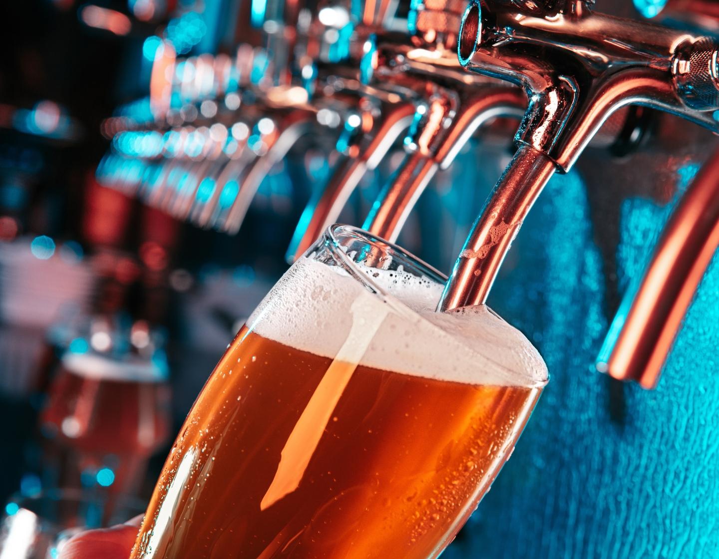 Close up of a pint being poured