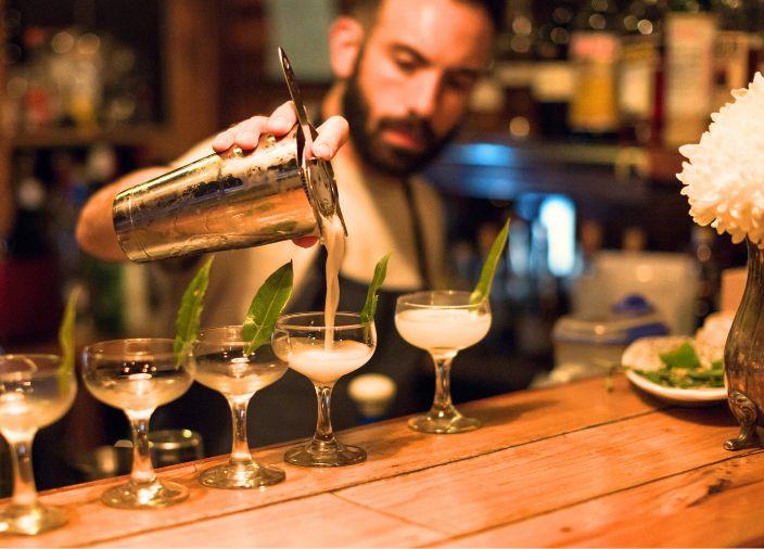 Tim Phillips-Johanson pouring a cocktail.