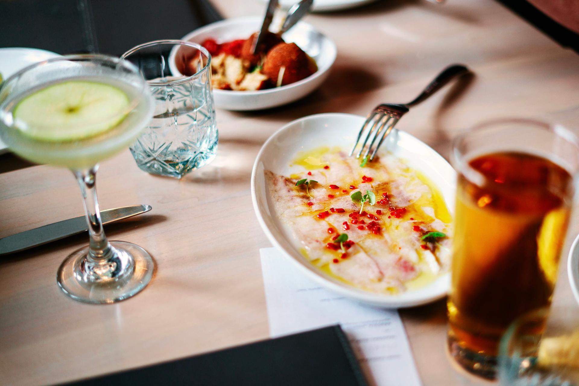 Plates of food in a cocktail bar