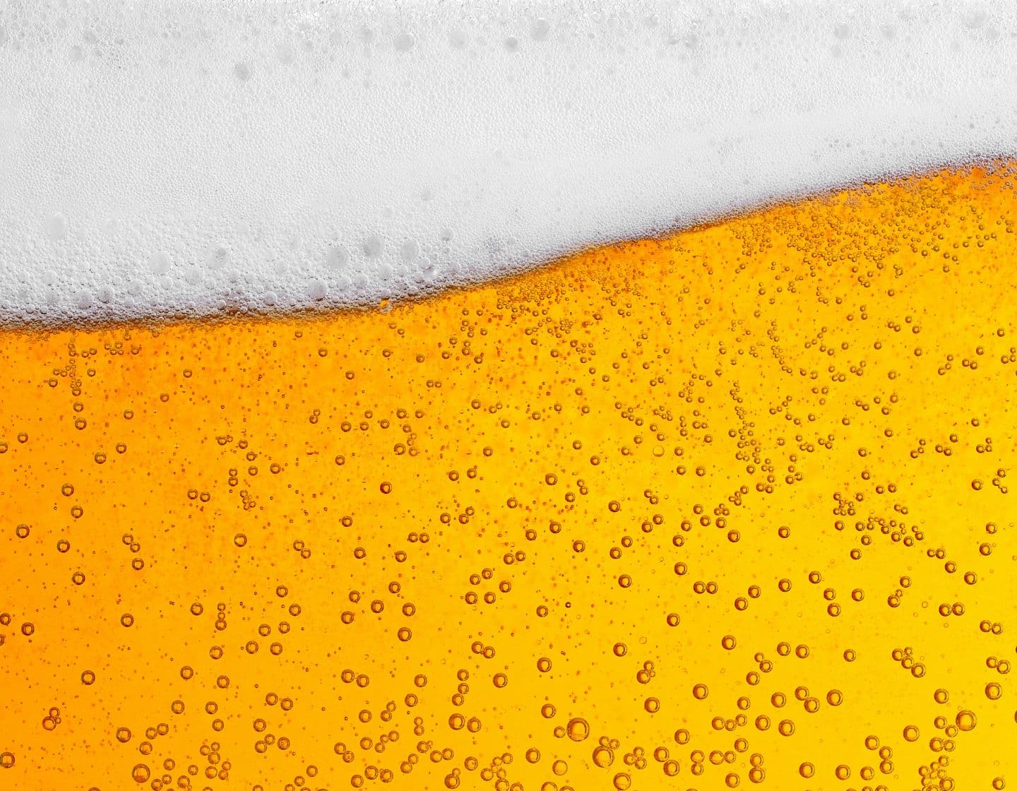   Close up of a pint being poured in a bar 