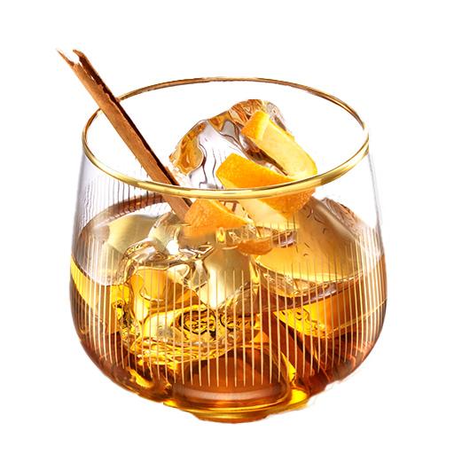 Cocktail in a Tall Glass with Lemon Garnish 