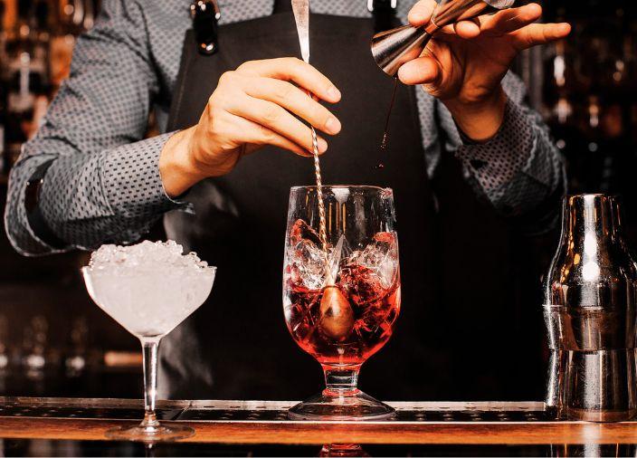 Bartender making a premium cocktail.
