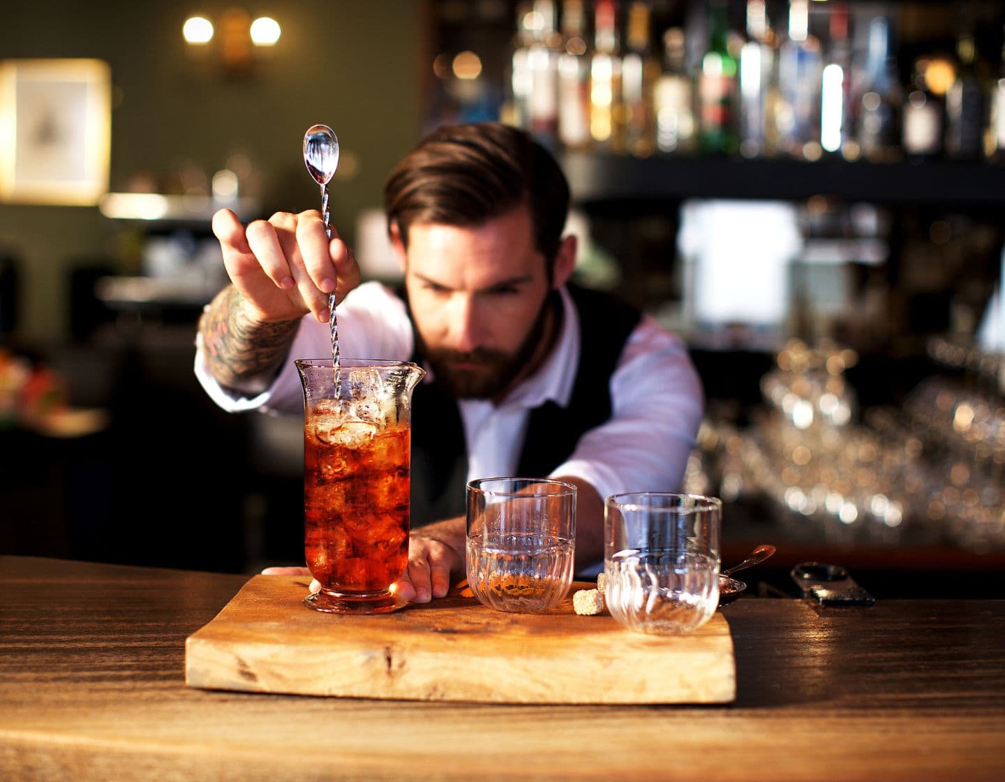 Bartender stirring a drink