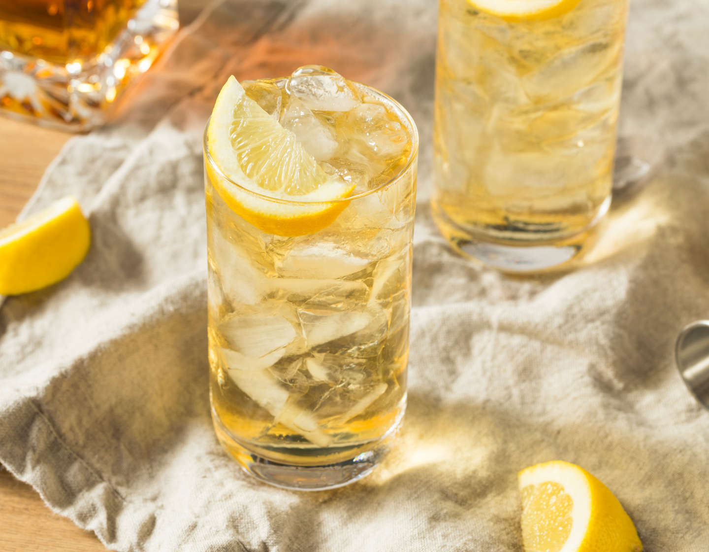 Johnnie Walker highball cocktail with lemon garnish and ice