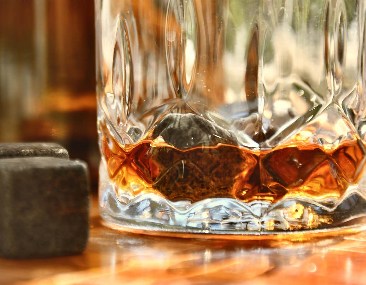 Close up shot of a glass of whiskey